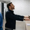 Office Romance Brett Goldstein Black Jacket